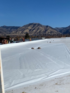 flat roof with mountains in the background