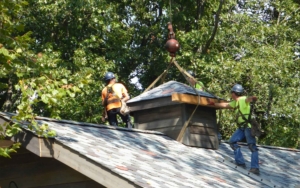 roofers installing a slate roof