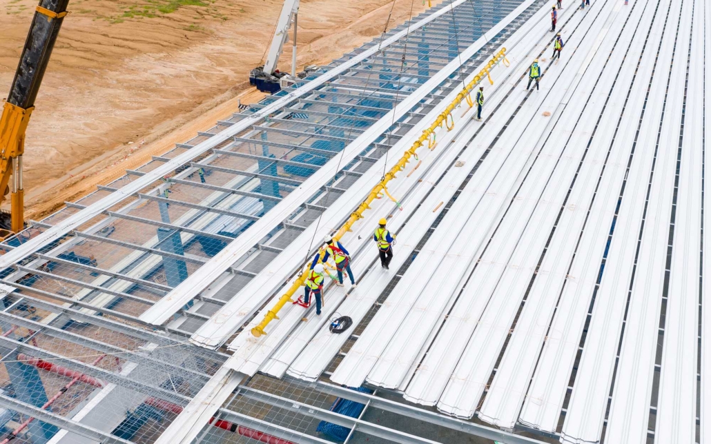 Overhead view of a commercial warehouse getting metal roof
