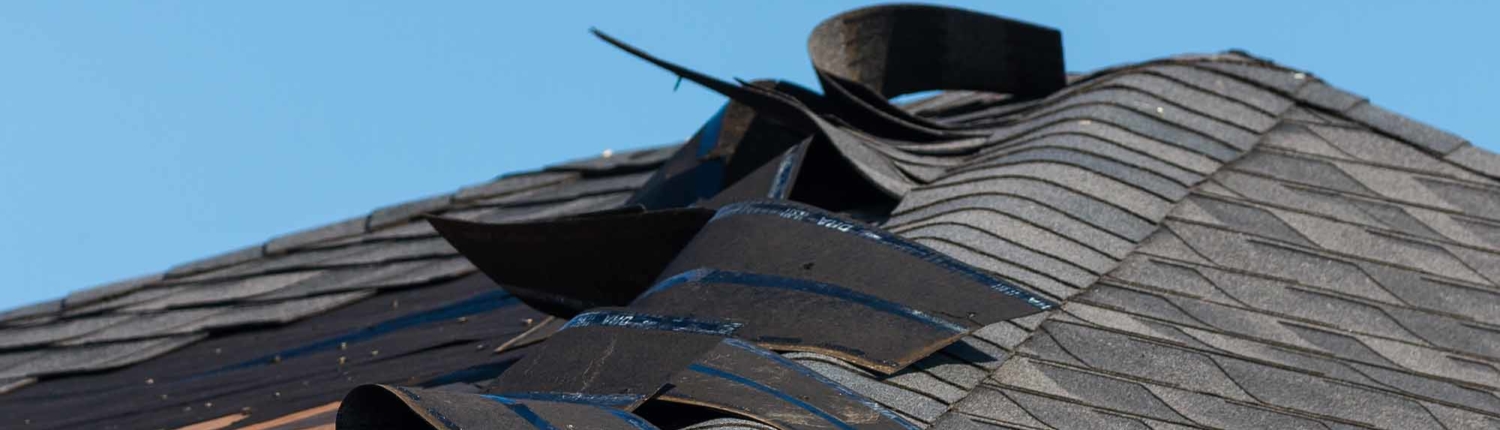 wind roof damage on residential building